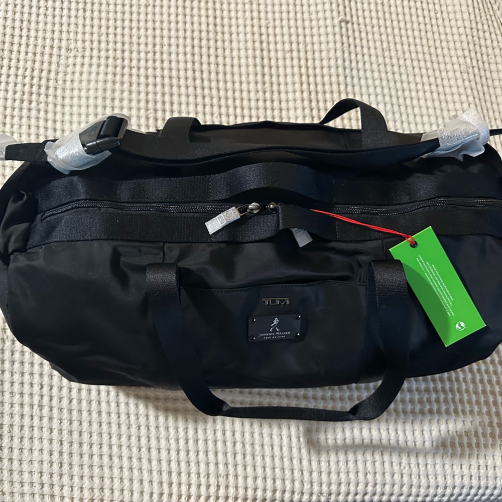 Tumi black nylon travel duffel, tote, bag, weekender, diaper bag, carry all